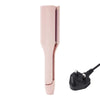 A pink professional ceramic hair curling iron with a black cord.