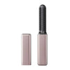 A portable wireless hair comb and curling iron in a dusty rose color.