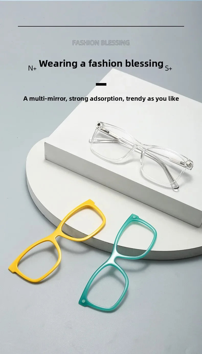 A set of three clear and colored anti-blue light eyewear frames displayed on a white surface.
