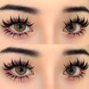 Close-up display of dramatic manga style false eyelashes on a model's eyes.