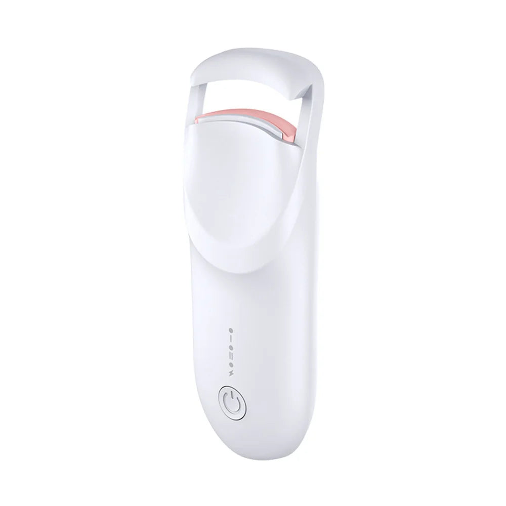 A white heated eyelash curler with a pink accent, shown from the side.