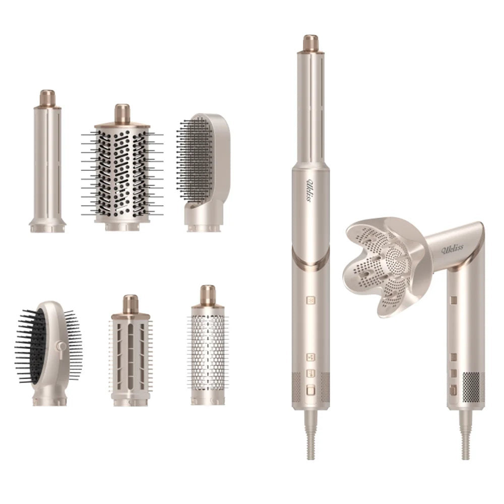 Eine Sammlung verschiedener Föhnbürsten und Stylingwerkzeuge in metallischem Finish.