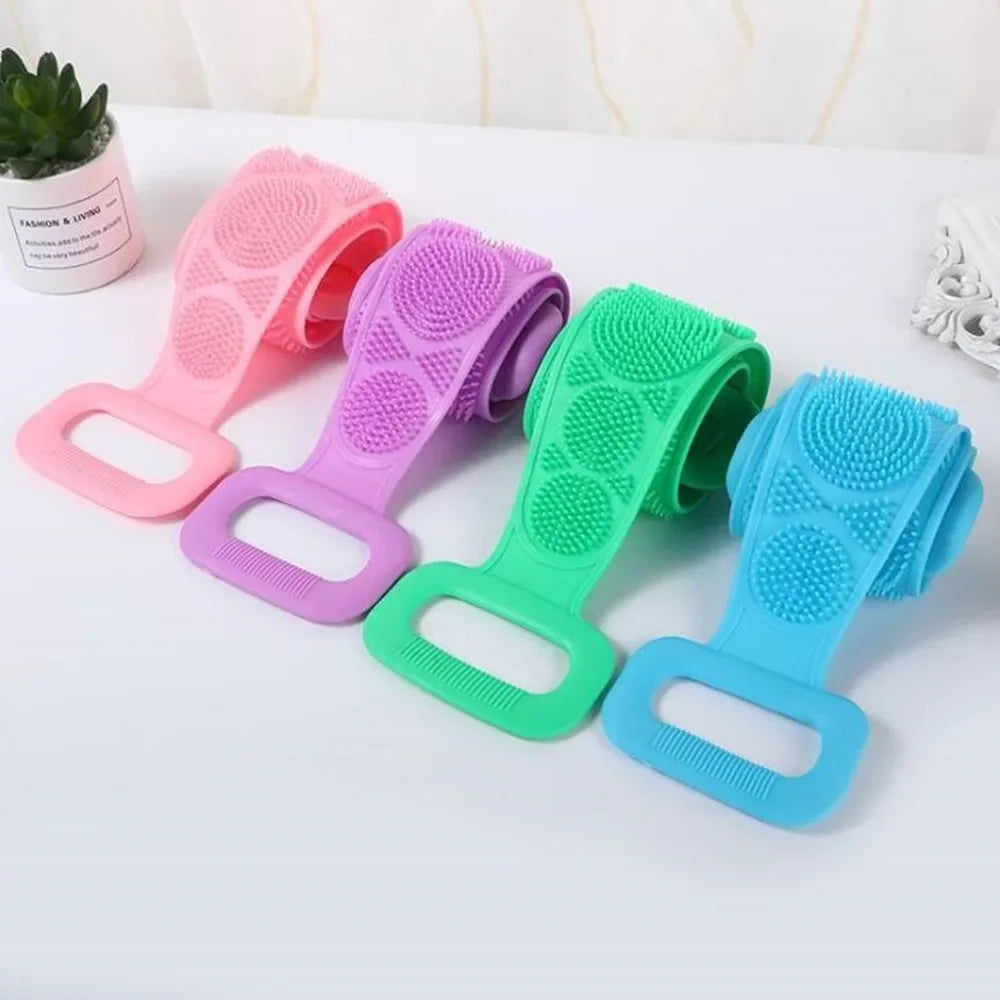 A collection of silicone dual-sided body scrub and exfoliating brushes in various colors including pink, purple, green, and b