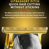 A close-up view of a gold-colored electric hair cutting device for precision haircuts.