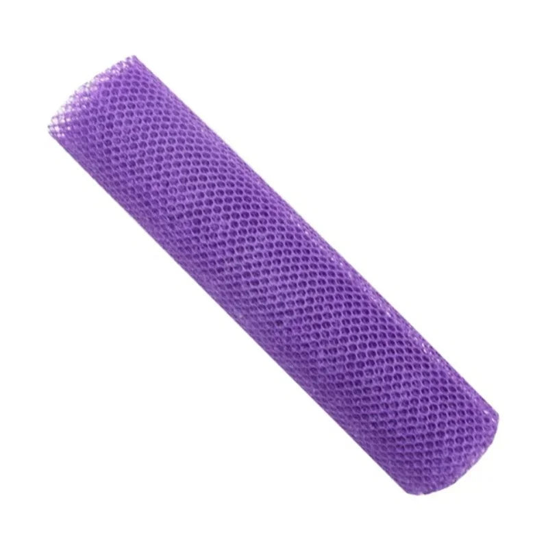 Purple exfoliating mesh body scrubbing towel rolled up