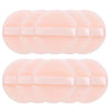 A set of soft pink velvet makeup puffs for concealer and powder application.