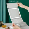 A hand adjusts a 360-degree adjustable foldable LED makeup mirror with magnification on a white surface.