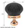 Pinceau de maquillage à cheveux en fibre noire avec manche plaqué or, vue de dessus.