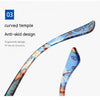 Curved temple anti-skid design of blue and orange reading glasses shown in detail.