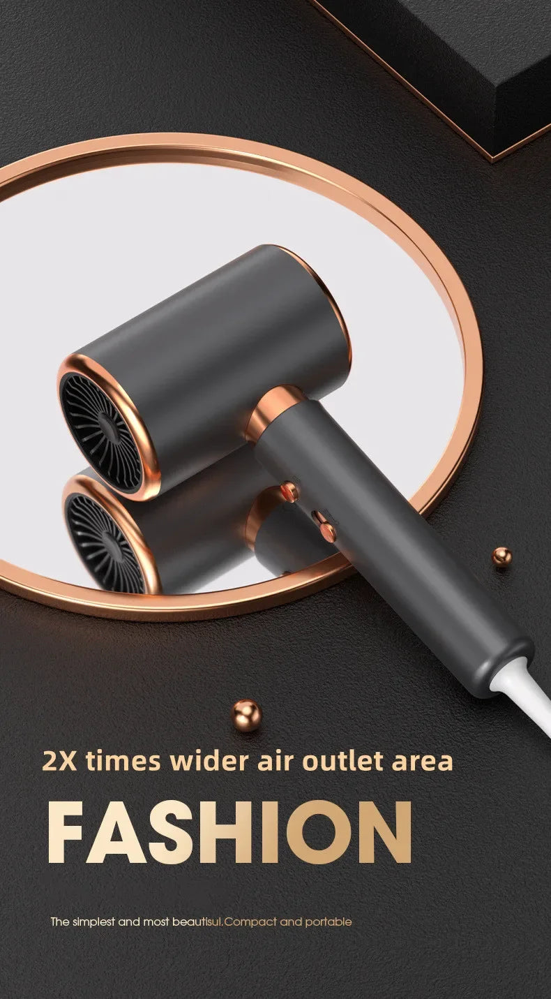 A sleek, black hair dryer with a gold accent is shown against a dark background.