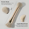 A long, beige powder brush with a gold handle and a round brush shown alongside a close-up of the bristles.