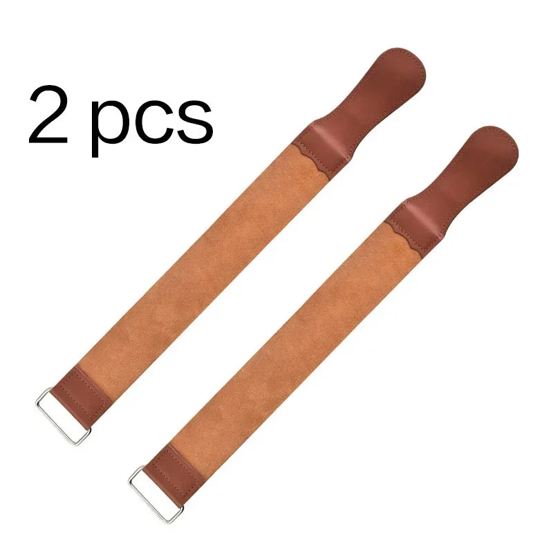 Two brown leather sharpening strips or strops for a straight razor.