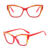 Red cat eye reading glasses with yellow accents shown against a white background.