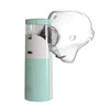 A light mint green portable mesh inhale nebulizer with a clear plastic mask and white body.