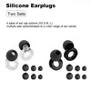 Deux paires de bouchons d'oreille en silicone noirs de différentes tailles et formes pour la réduction du bruit