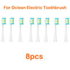 Eight replacement brush heads for an Ocean electric toothbrush are displayed side by side.
