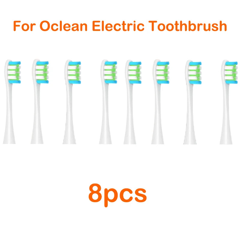 Eight replacement brush heads for an Ocean electric toothbrush are displayed side by side.