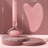 Pink beauty device featuring a heart-shaped scratch plate and roller for relaxation massage