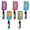 A collection of six nylon bristle detangling combs in various colors including purple pink teal and gold