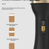 Close-up of a black hair dryer brush with three gear mode selection options displayed on the body.