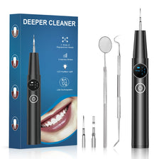 Caja de limpieza dental ultrasónica profesional negra y varias cabezales de reemplazo junto al dispositivo.