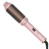 A pink professional ceramic volumizing curling iron with black bristles and a coiled cord.