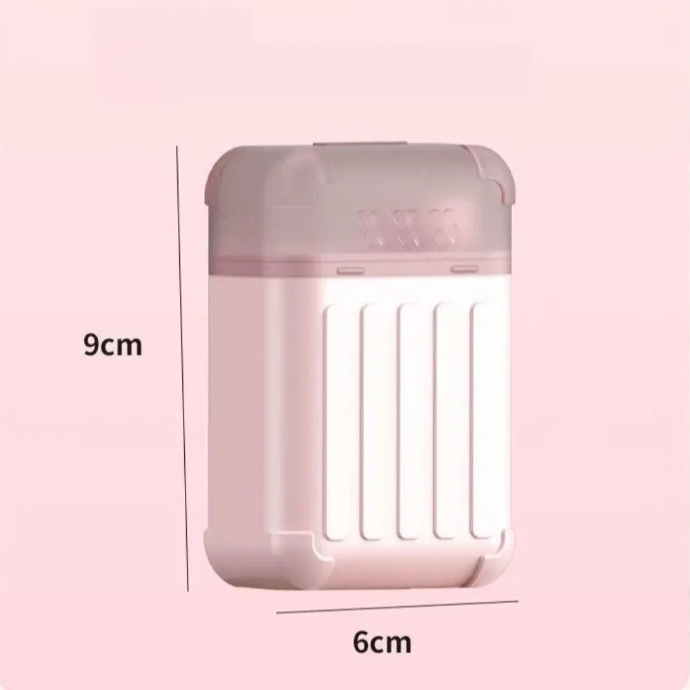 Kit jetable rectangulaire rose pâle pour nettoyer les oreilles, avec un haut translucide et un corps côtelé.