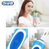 A woman is shown using an Oral-Style electric toothbrush for deep cleaning, highlighting the brush and its blue handle.