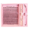 A pink tray holding a DIY lash extension kit with bond, seal, and remover products.