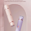 A pink and purple double headed shaver is shown in a vertical angle against a light background.