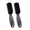 A pair of black professional neck and facial hair duster brushes.