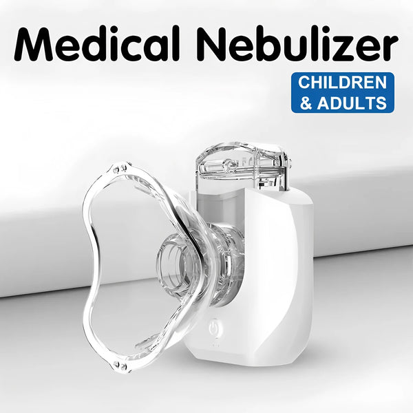 A white portable medical nebulizer device with a clear mask component is shown on a white surface.