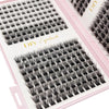 A close-up of a pink tray containing black bulk cluster eyelash extensions for DIY makeup application.