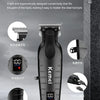 A black Kemi electric hair and beard trimmer is shown on a reflective surface.