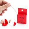 A hand is shown pulling a red mapping string from a red box, demonstrating the pre-inked eyebrow mapping thread.