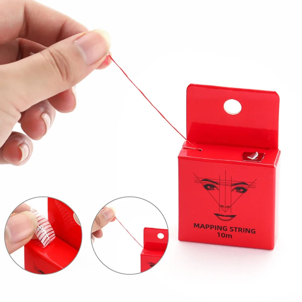 A hand is shown pulling a thin red string from a red box, demonstrating an eyebrow mapping thread.