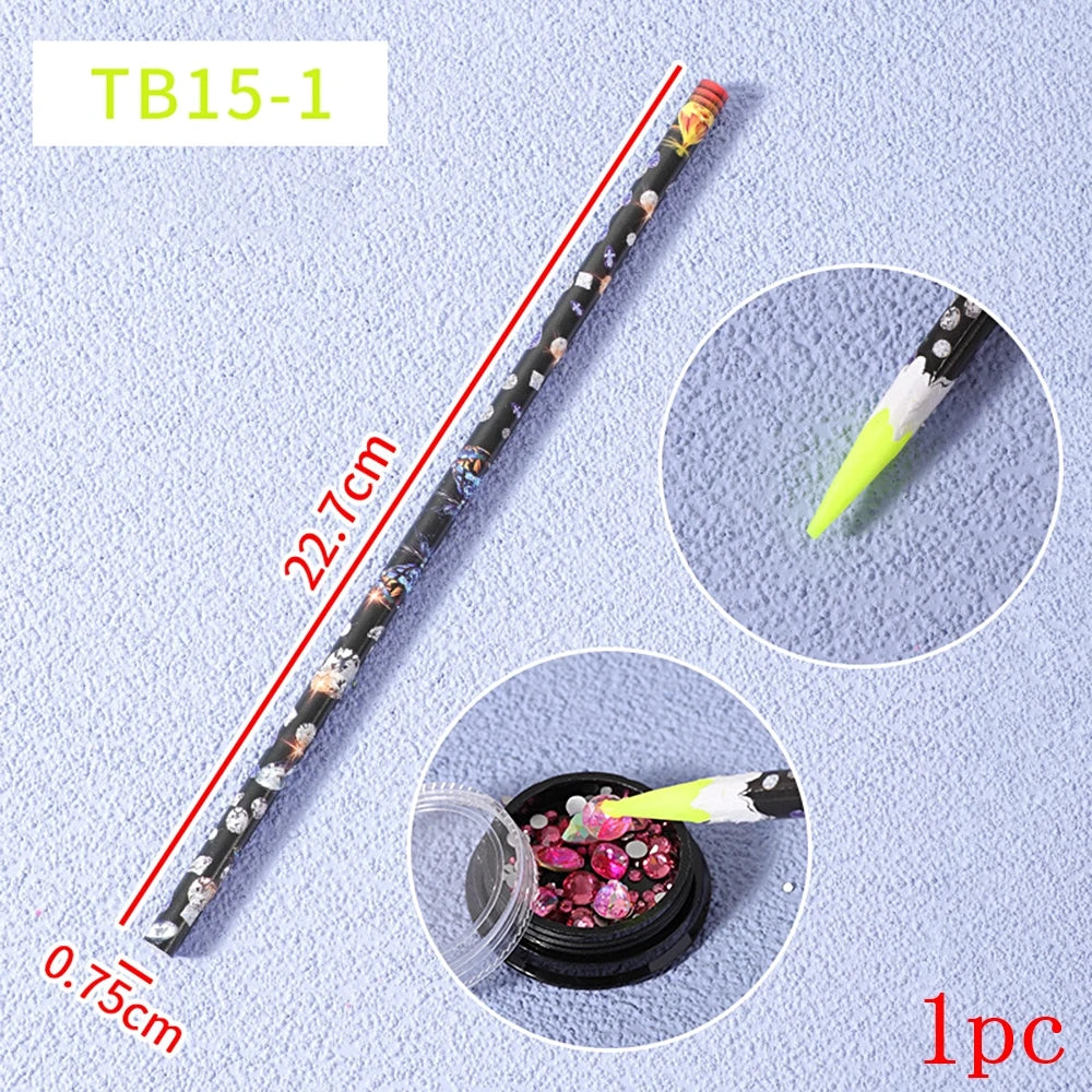 A long, thin nail art rhinestone wax picker pencil labeled TB15-1 shown next to an inset of the yellow tip and a small contai