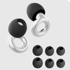 A set of reusable high-fidelity ear plugs in black and silver, shown from above.