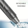 Close-up view of a detachable washable electric nose hair trimmer submerged in water.
