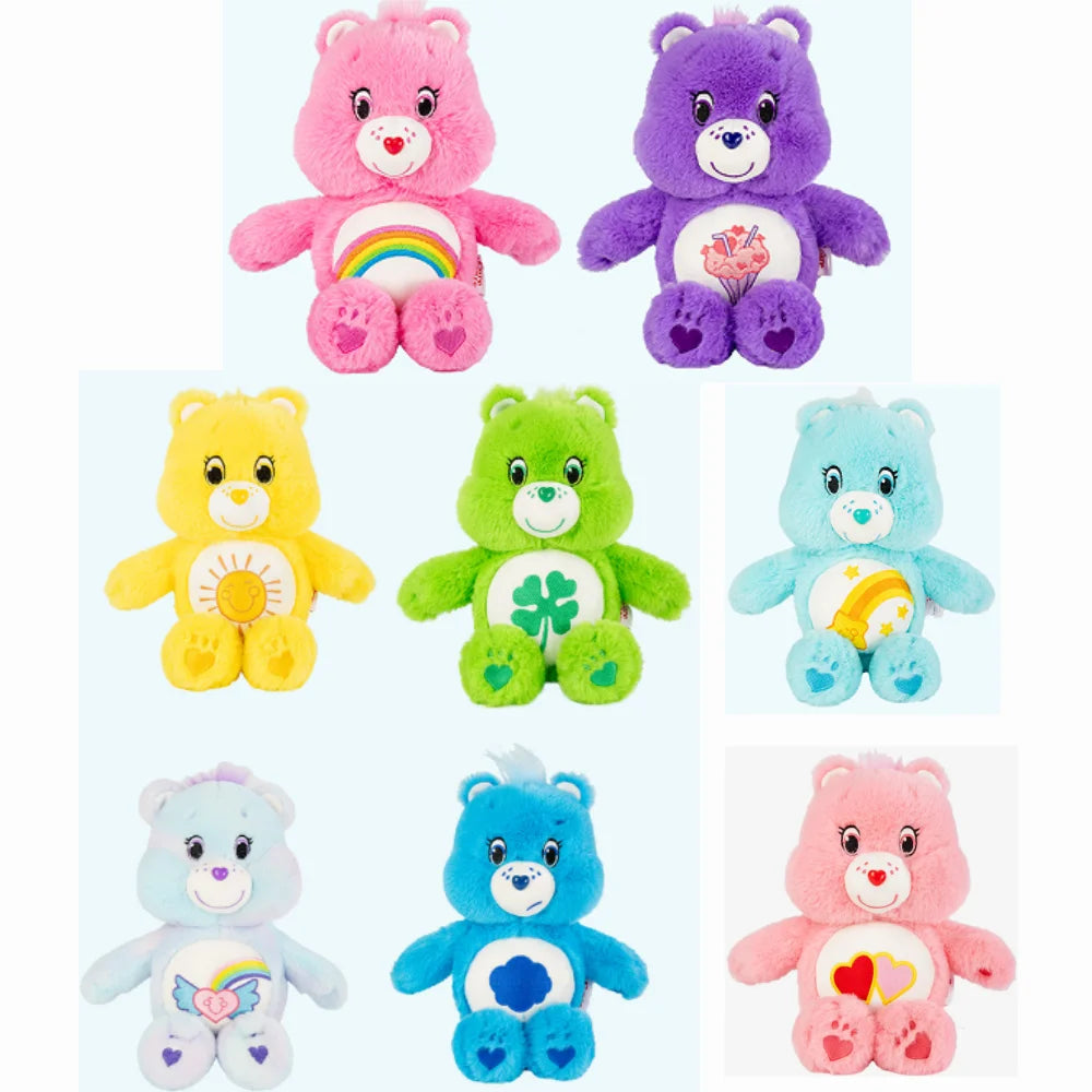 A collection of various colored Care Bears plush stuffed animals.
