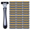 A set of stainless steel safety razors with replaceable triple-blade heads arranged in a grid.