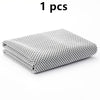One folded ultra soft quick-dry sport towel with a black and white geometric pattern.