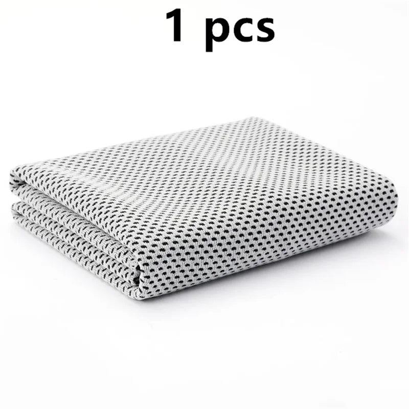 One folded ultra soft quick-dry sport towel with a black and white geometric pattern.