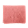 A rectangular pink reusable exfoliating bath sponge washcloth made of a mesh material.