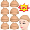 Eight pieces of beige nylon wig caps shown in various angles and on a mannequin head.