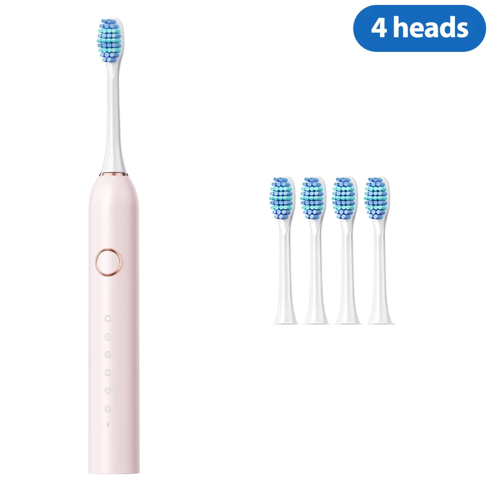 A pink professional sonic electric toothbrush with four blue cleaning heads shown next to the full brush.