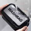 A hand is holding a black cosmetic storage bag filled with water, being rinsed under a faucet.