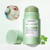 A stick of BARUBT MUGWORT ACNE CLAY STICK in a light green jar with a circular swatch of skin nearby.