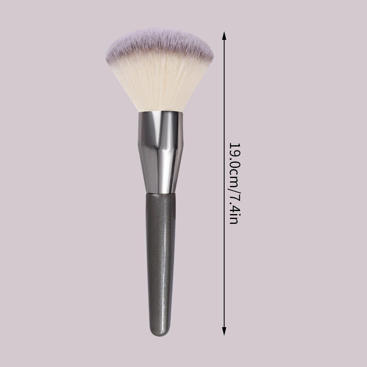 A silver face powder brush with a large, fluffy, purple-tinted synthetic hair and a long handle.