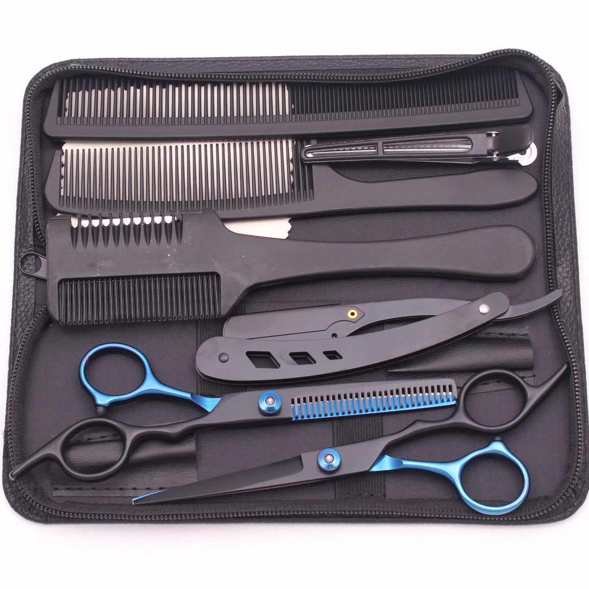 A black case containing professional stainless steel hairdressing scissors and grooming tools.